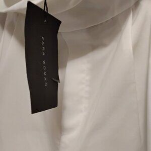 Zara white pants  size m/lg double material on top very fashionable